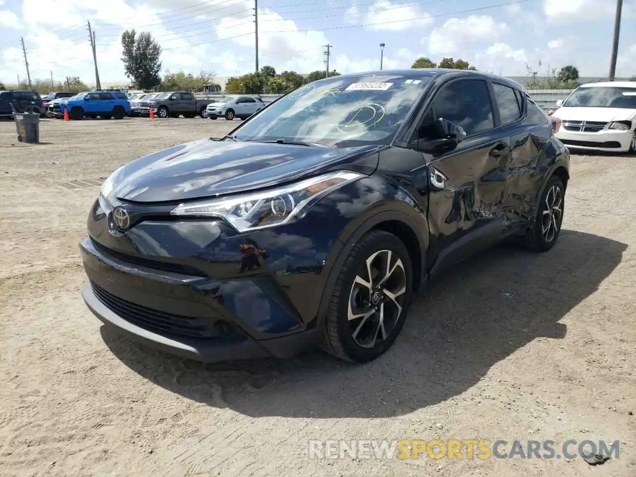 2 Photograph of a damaged car JTNKHMBX7K1060448 TOYOTA C-HR 2019