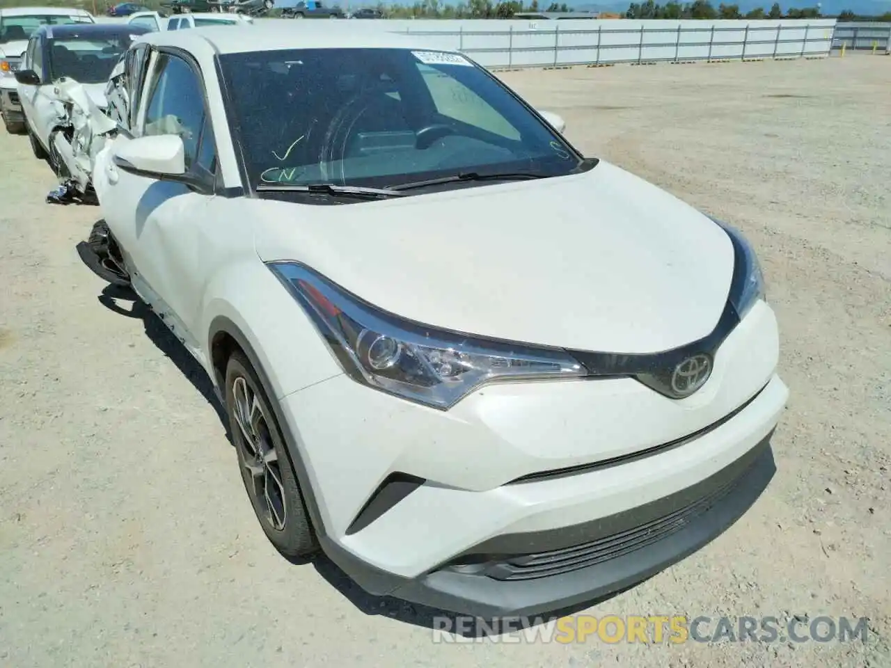 1 Photograph of a damaged car JTNKHMBX8K1012487 TOYOTA C-HR 2019