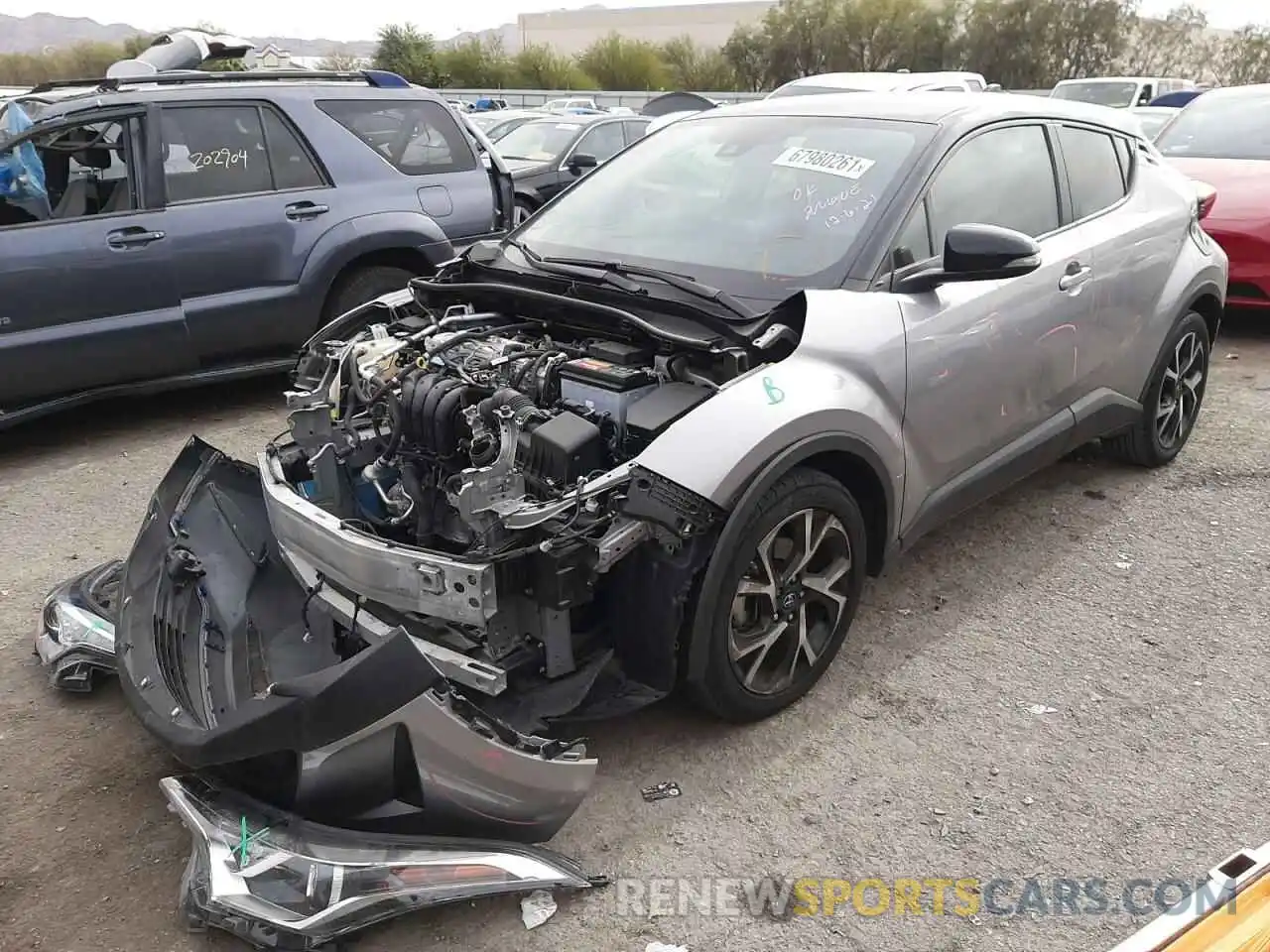 2 Photograph of a damaged car JTNKHMBX8K1022565 TOYOTA C-HR 2019