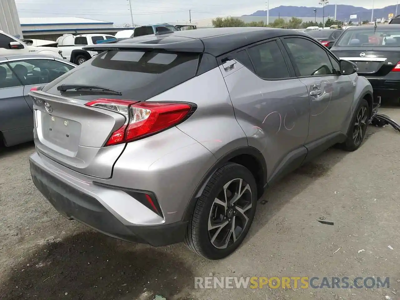 4 Photograph of a damaged car JTNKHMBX8K1022565 TOYOTA C-HR 2019