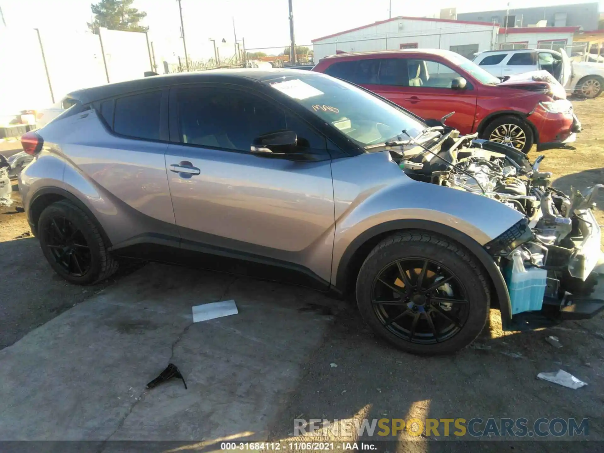 1 Фотография поврежденного автомобиля JTNKHMBX8K1025031 TOYOTA C-HR 2019