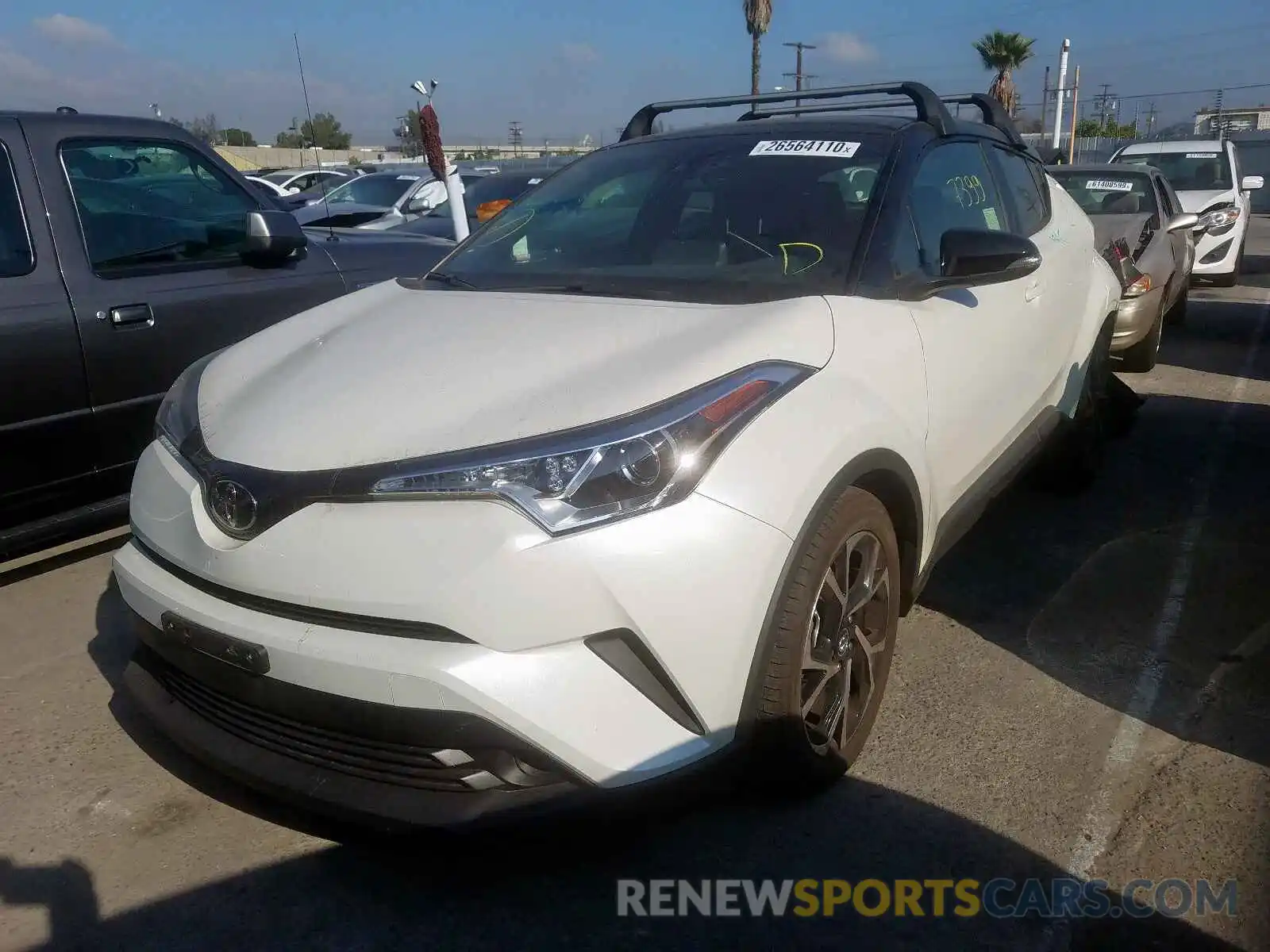 2 Photograph of a damaged car JTNKHMBX8K1030598 TOYOTA C-HR 2019