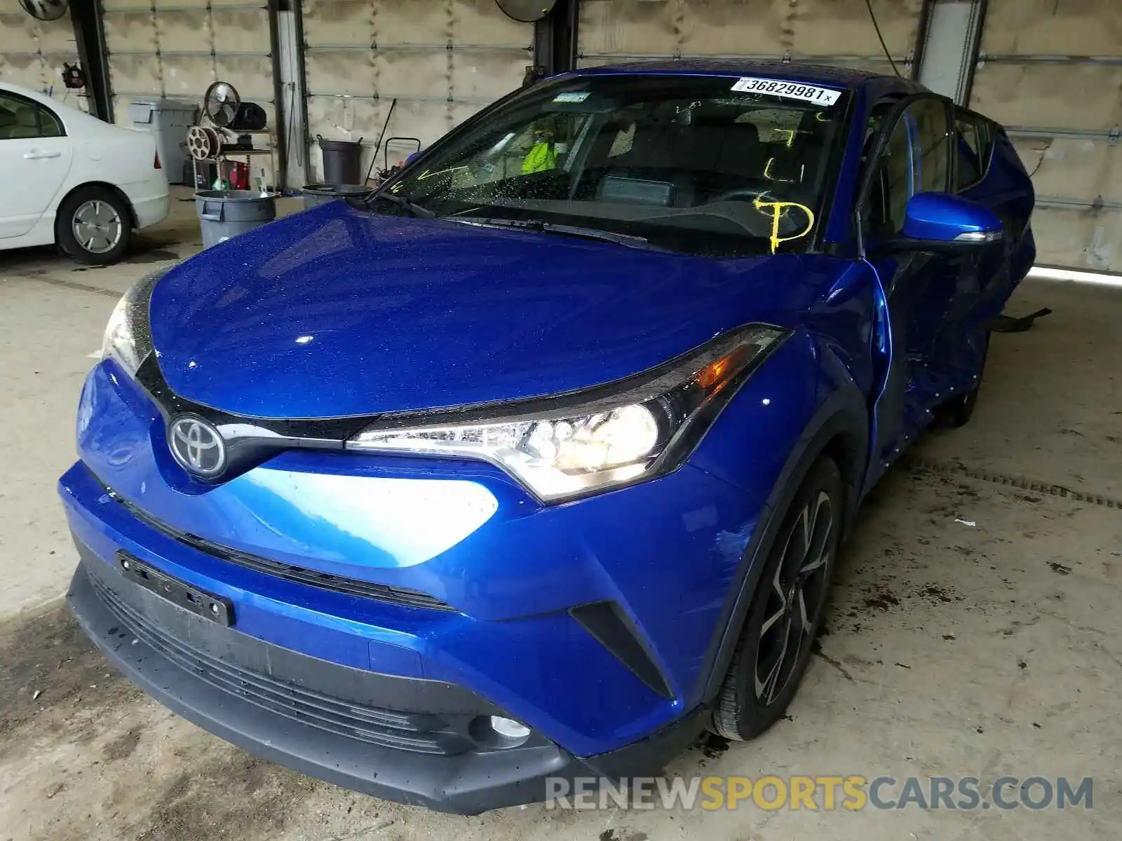 2 Photograph of a damaged car JTNKHMBX8K1035123 TOYOTA C-HR 2019