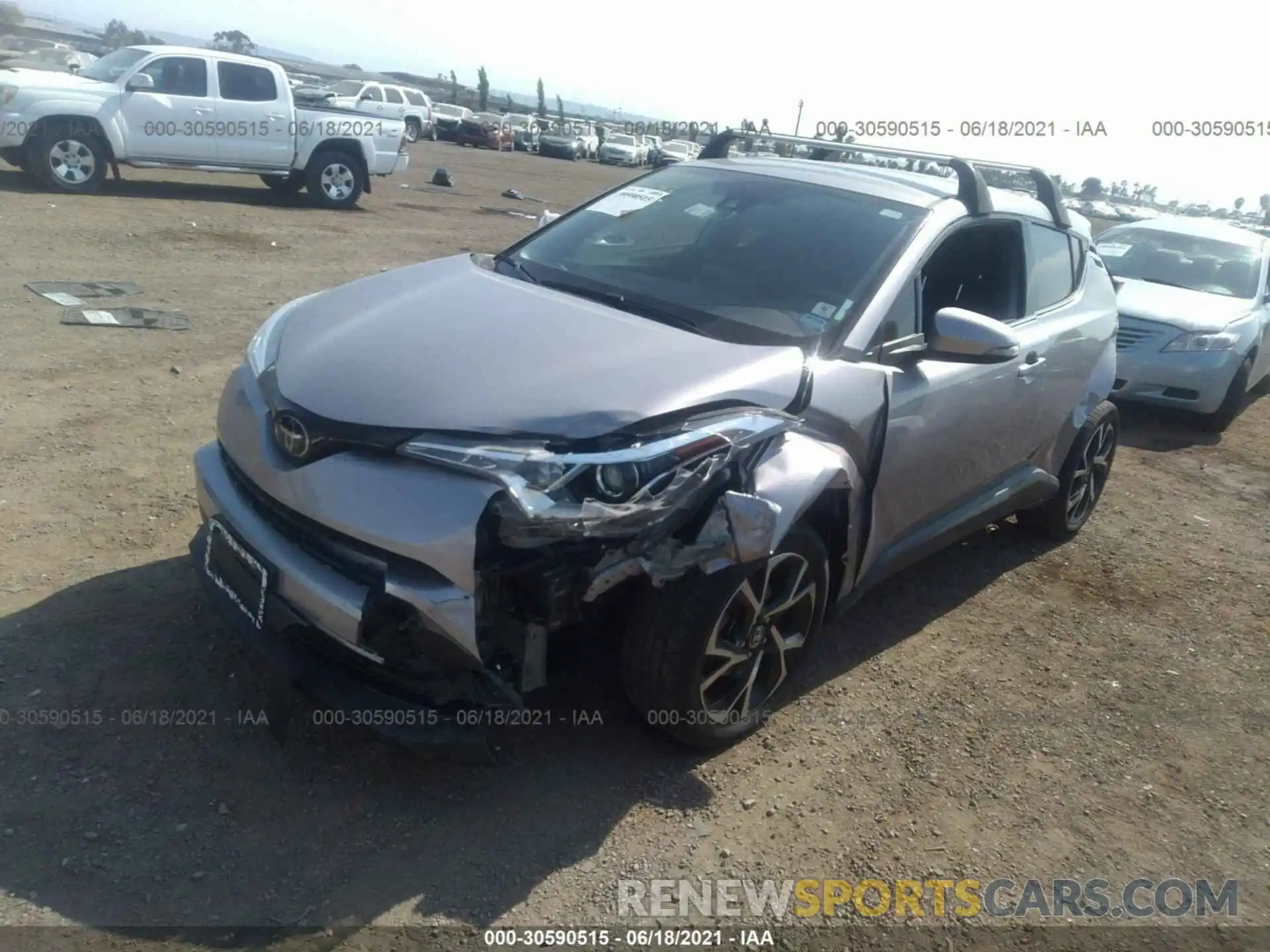 2 Photograph of a damaged car JTNKHMBX8K1043688 TOYOTA C-HR 2019