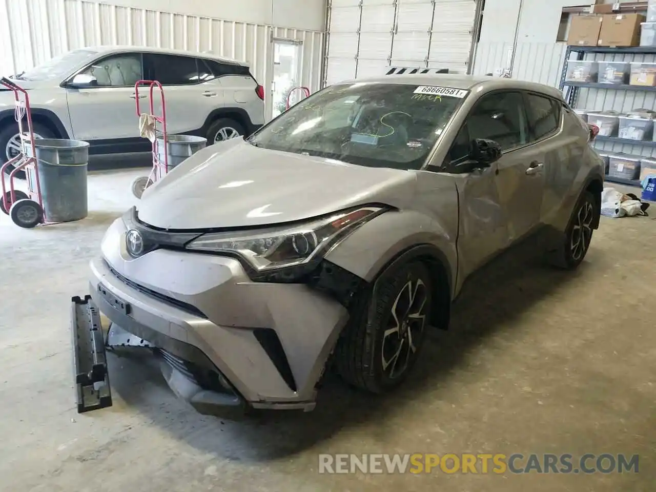 2 Photograph of a damaged car JTNKHMBX8K1052231 TOYOTA C-HR 2019