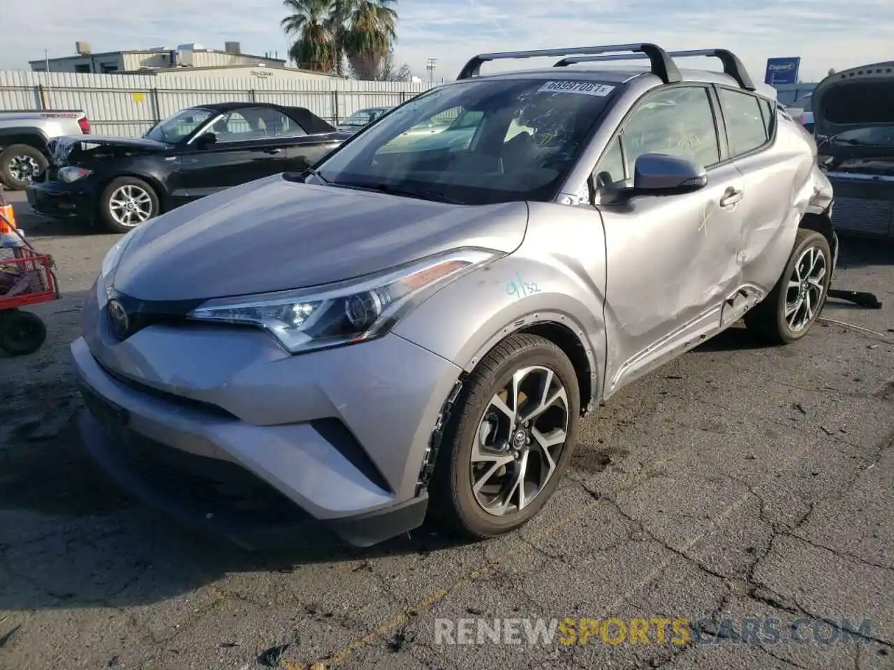 2 Photograph of a damaged car JTNKHMBX8K1056537 TOYOTA C-HR 2019