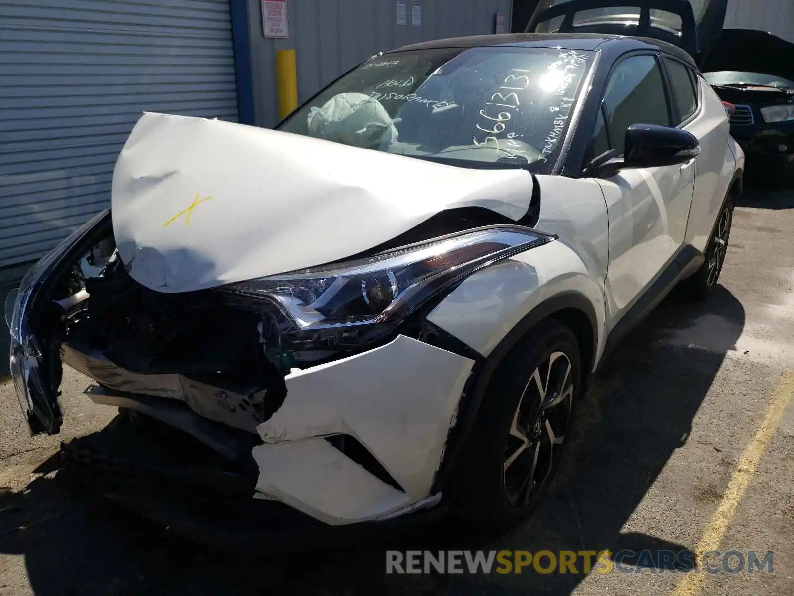 2 Photograph of a damaged car JTNKHMBX8K1060328 TOYOTA C-HR 2019