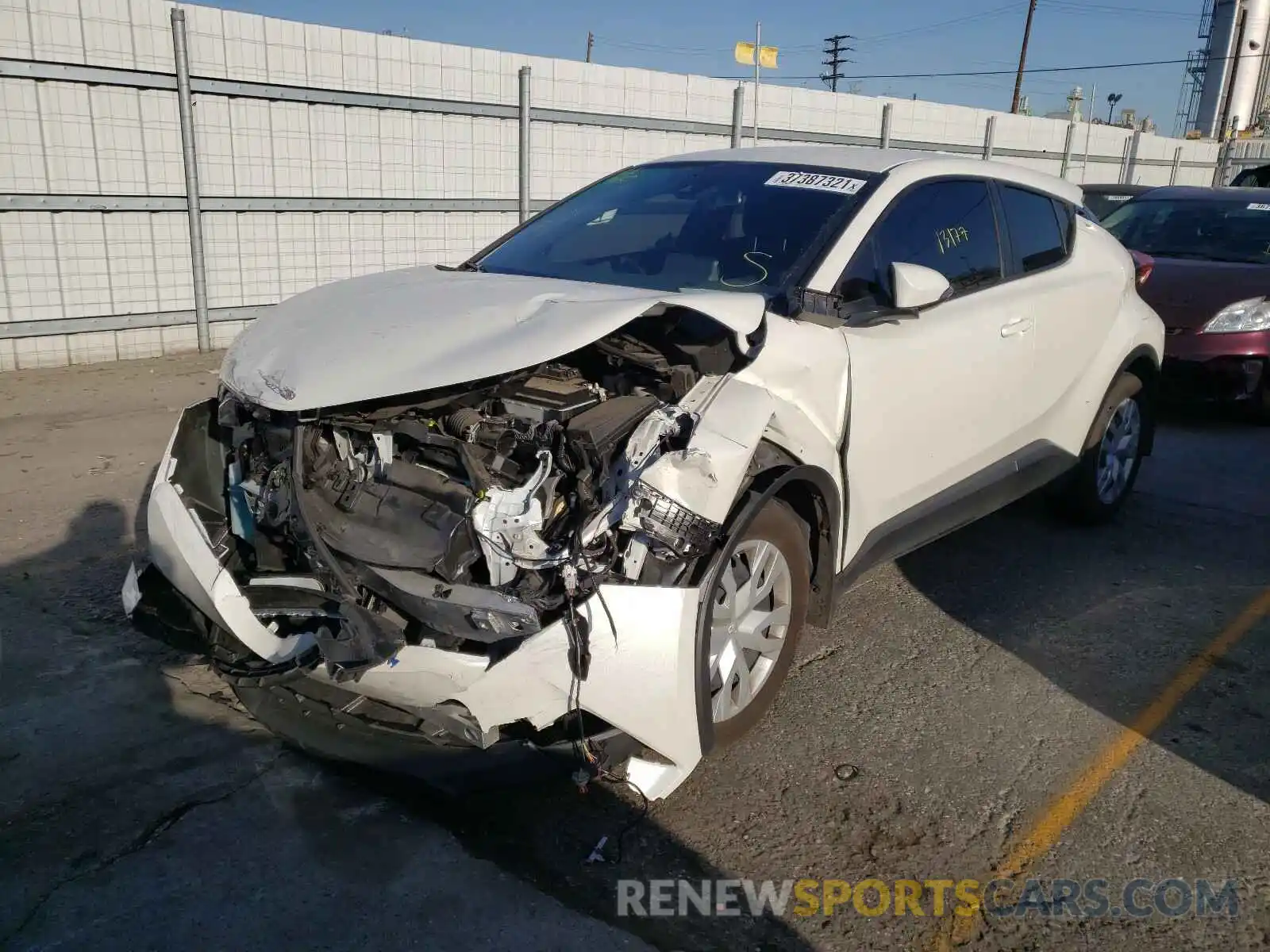 2 Photograph of a damaged car JTNKHMBX8K1062371 TOYOTA C-HR 2019