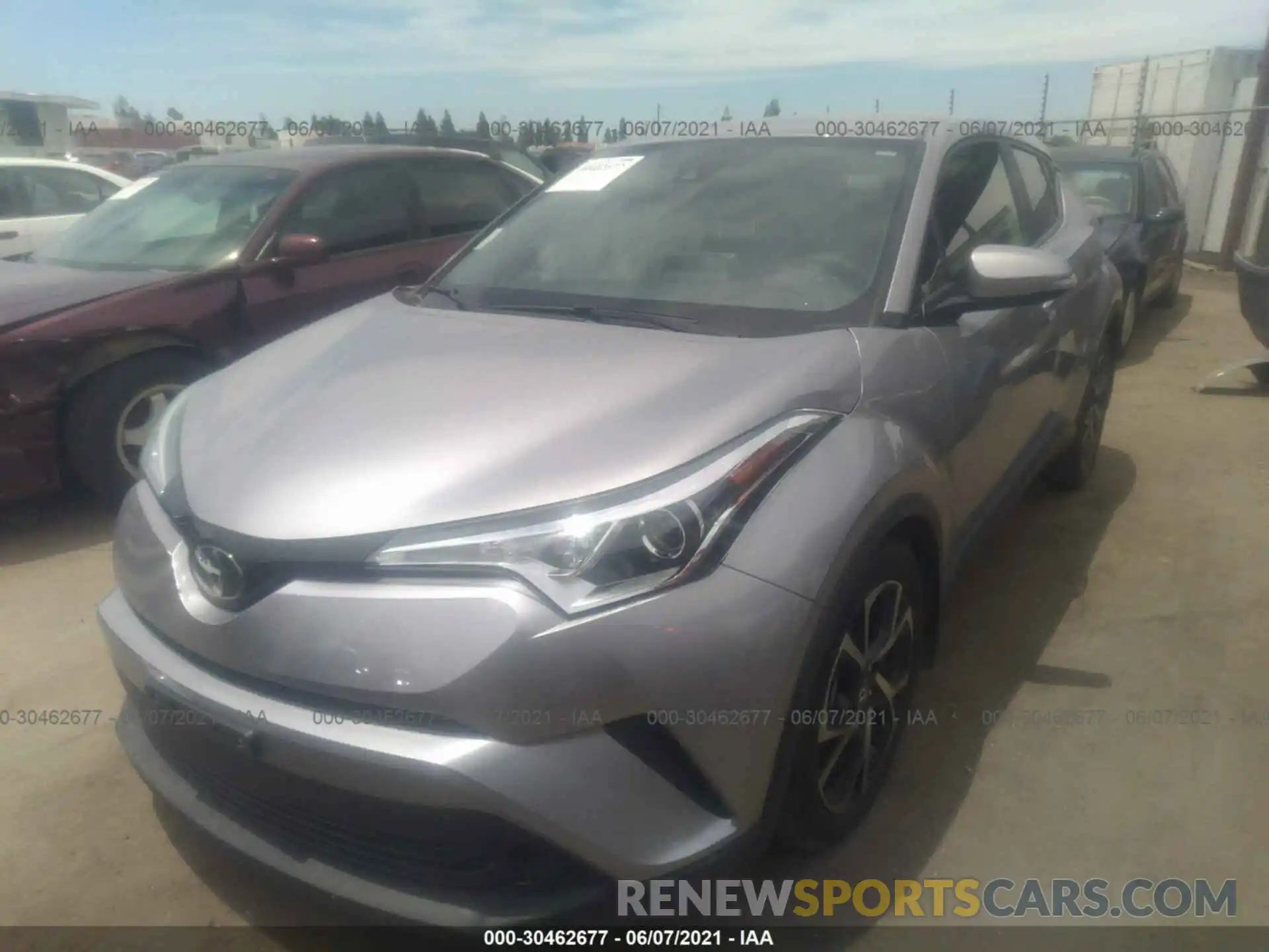 2 Photograph of a damaged car JTNKHMBX8K1062385 TOYOTA C-HR 2019