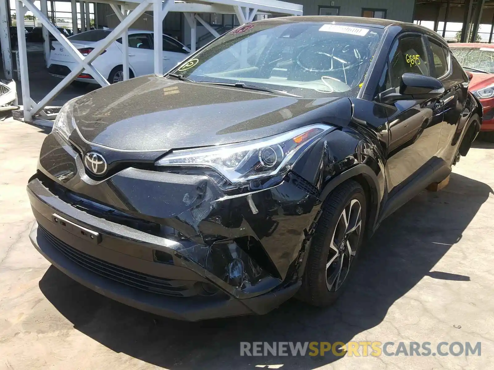 2 Photograph of a damaged car JTNKHMBX9K1049144 TOYOTA C-HR 2019