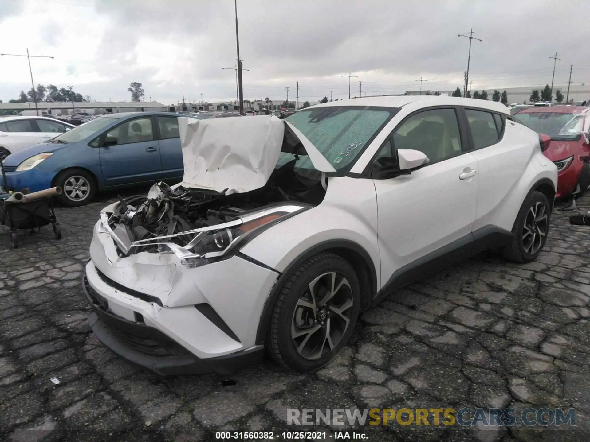 2 Photograph of a damaged car JTNKHMBXXK1015035 TOYOTA C-HR 2019