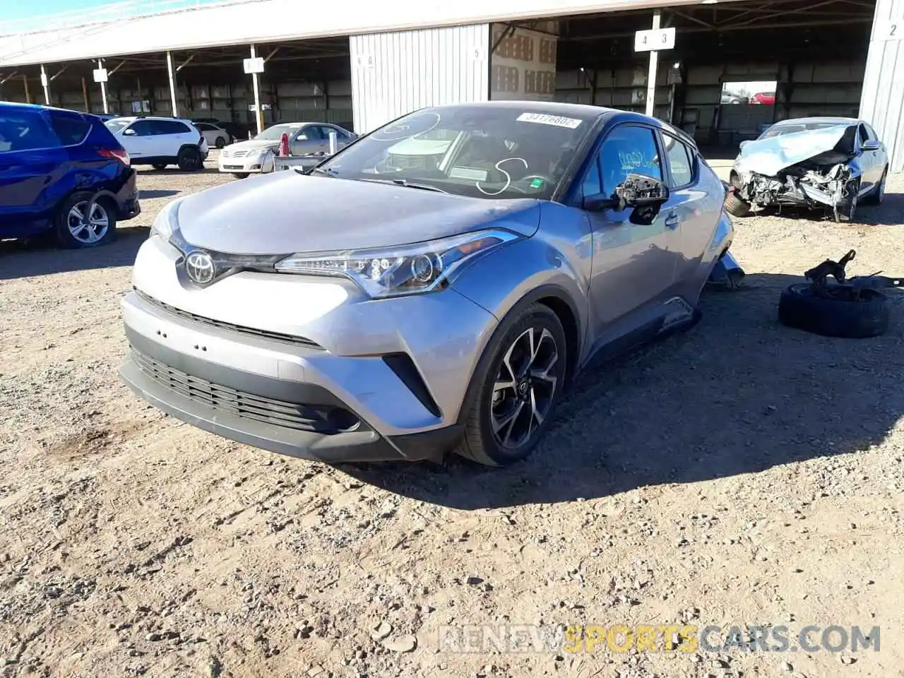 2 Photograph of a damaged car JTNKHMBXXK1020039 TOYOTA C-HR 2019