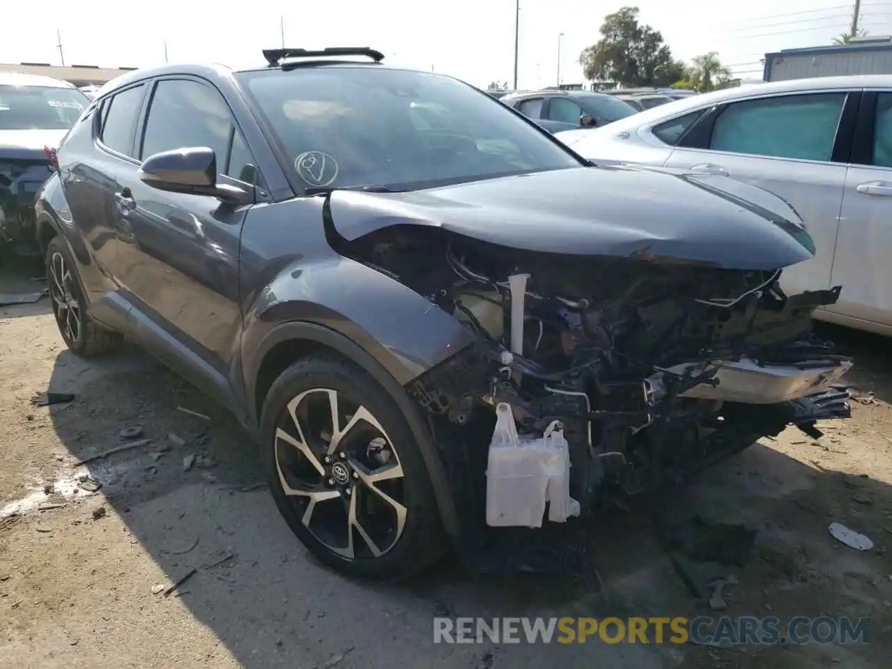 1 Photograph of a damaged car JTNKHMBXXK1021207 TOYOTA C-HR 2019