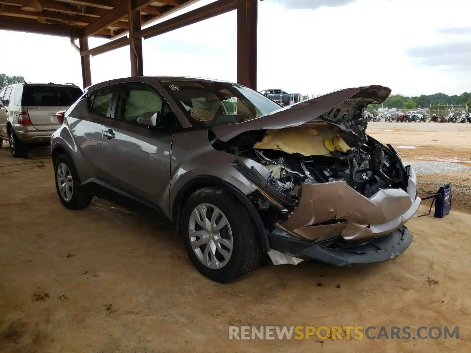 1 Photograph of a damaged car JTNKHMBXXK1023118 TOYOTA C-HR 2019