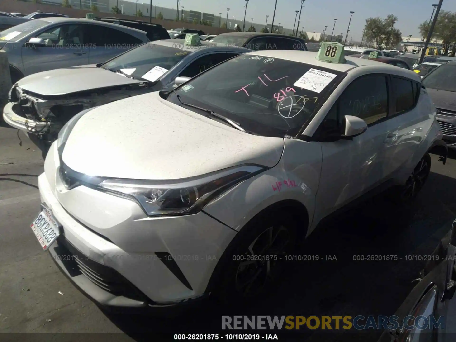 2 Photograph of a damaged car JTNKHMBXXK1023796 TOYOTA C-HR 2019