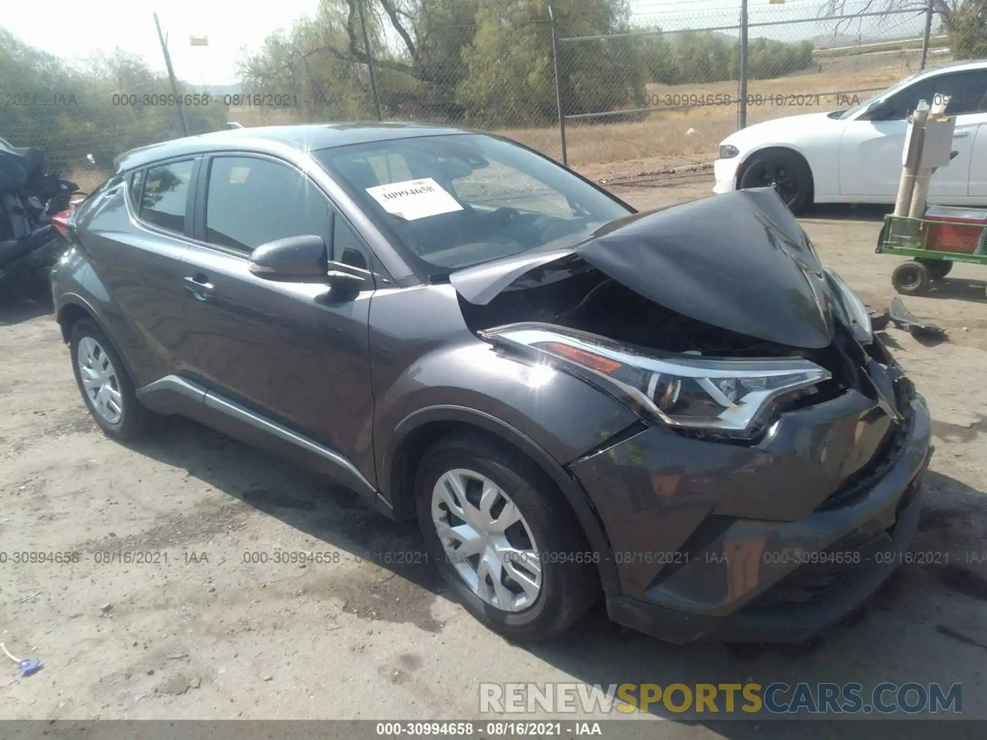 1 Photograph of a damaged car JTNKHMBXXK1024138 TOYOTA C-HR 2019