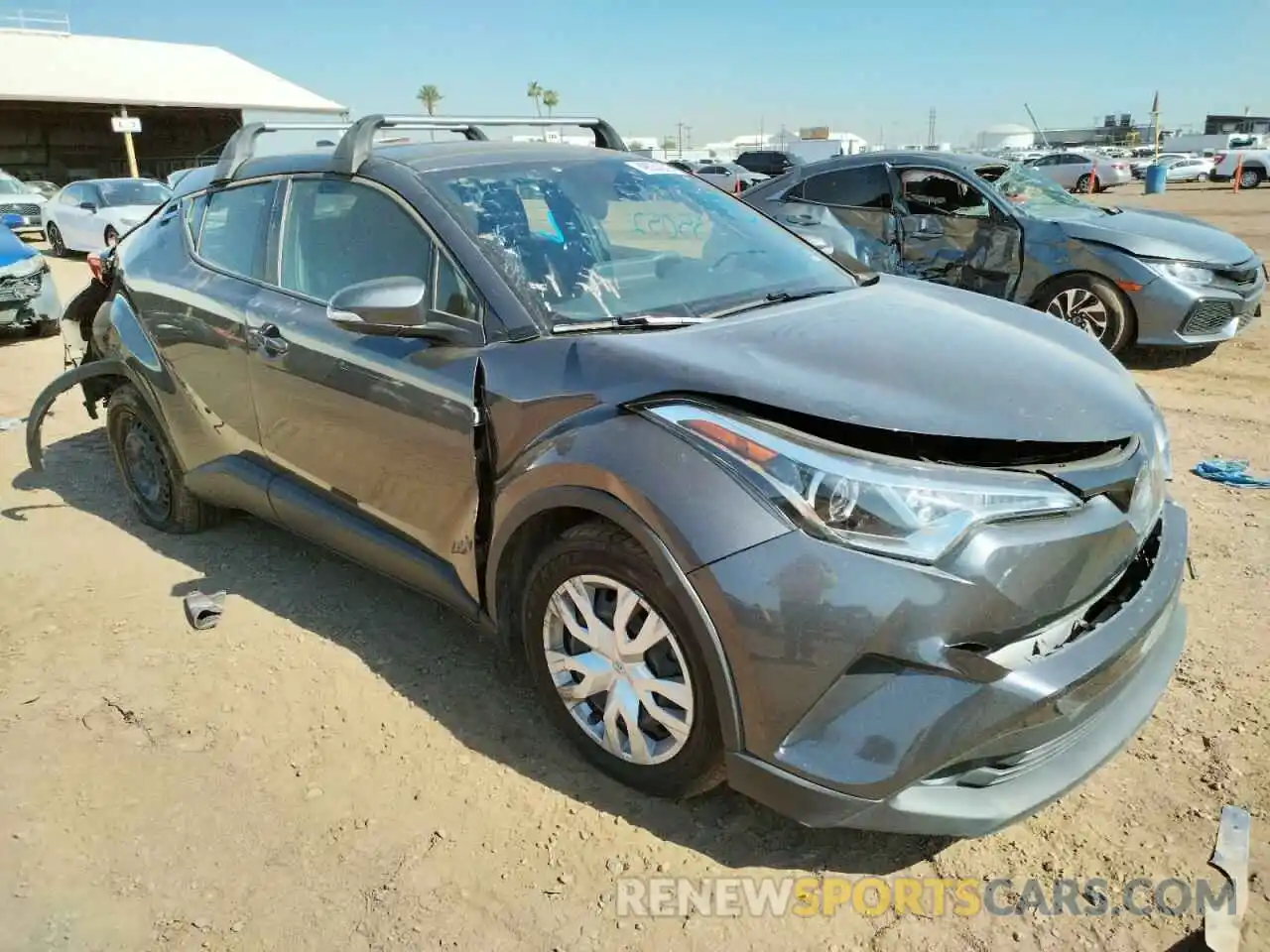 1 Photograph of a damaged car JTNKHMBXXK1032014 TOYOTA C-HR 2019