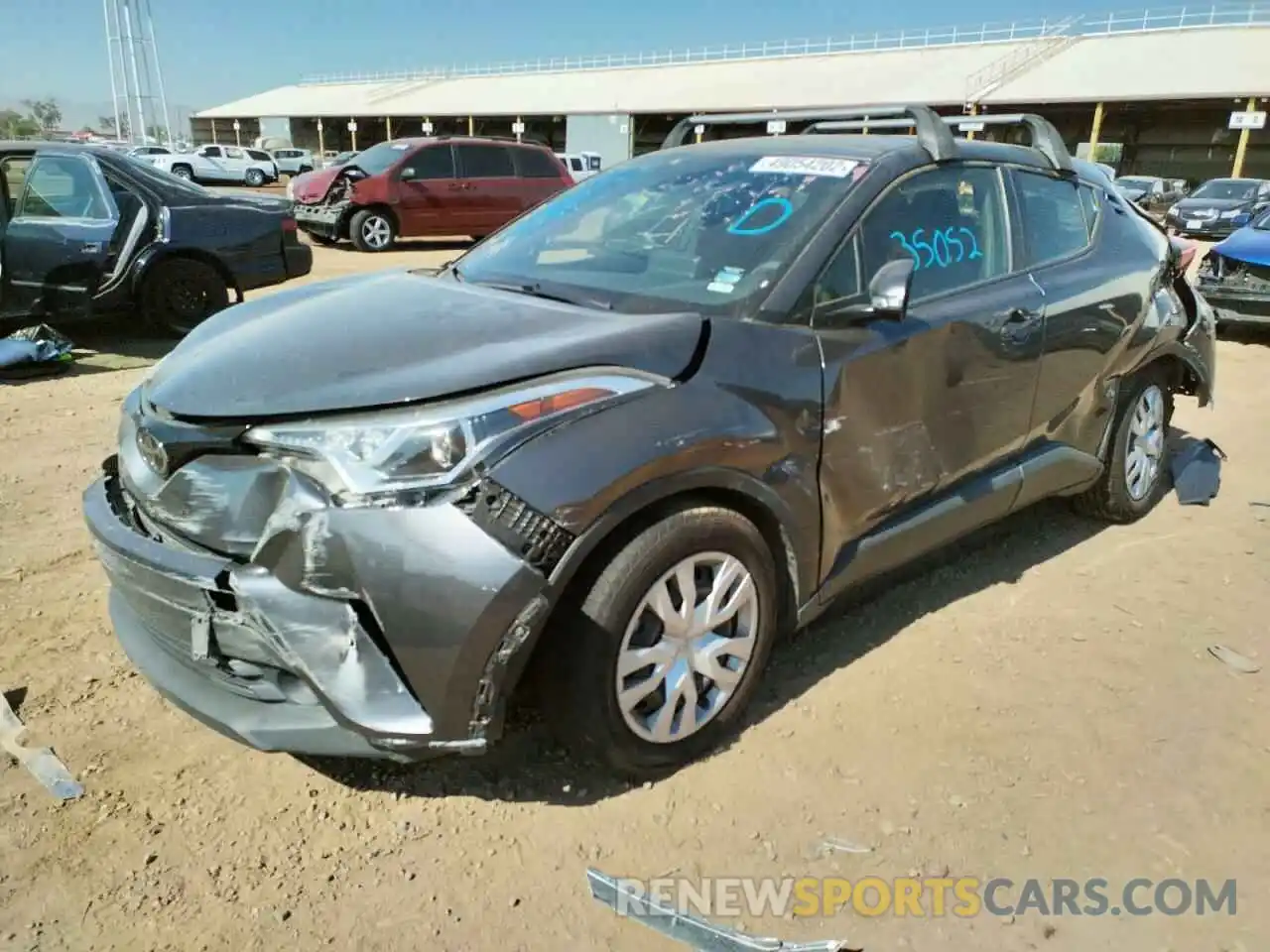 2 Photograph of a damaged car JTNKHMBXXK1032014 TOYOTA C-HR 2019