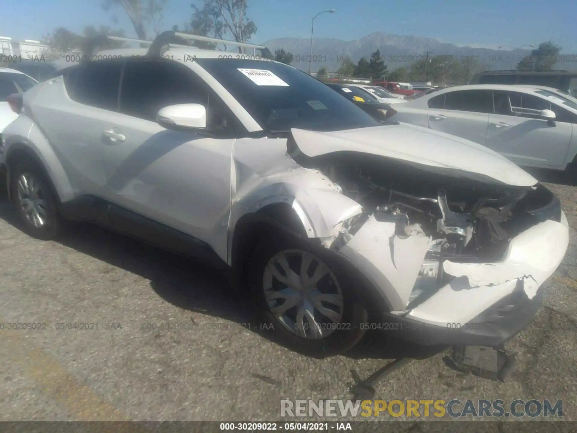 1 Photograph of a damaged car JTNKHMBXXK1057821 TOYOTA C-HR 2019