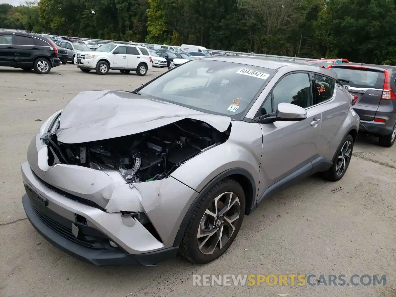 2 Photograph of a damaged car NMTKHMBX0KR084239 TOYOTA C-HR 2019