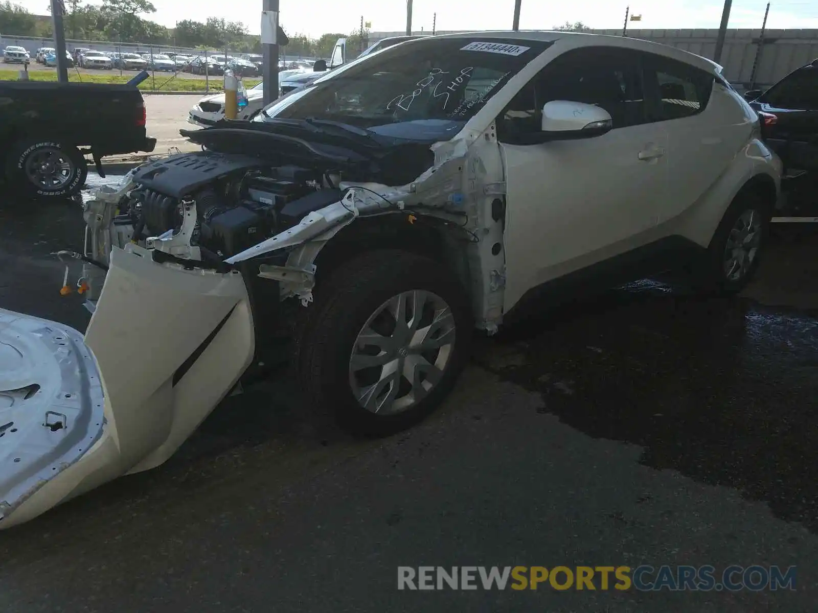 2 Photograph of a damaged car NMTKHMBX1KR075033 TOYOTA C-HR 2019