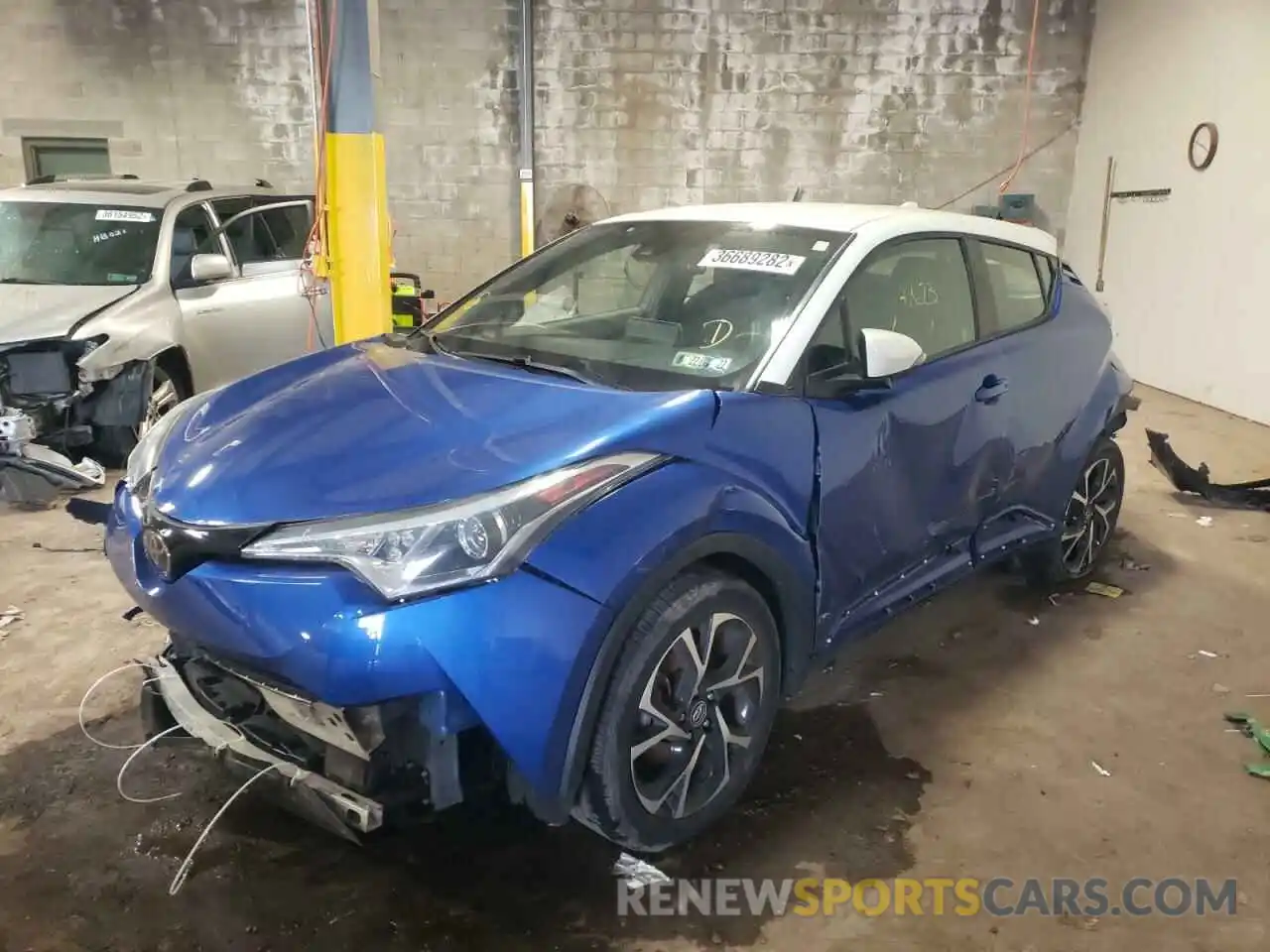 2 Photograph of a damaged car NMTKHMBX1KR094889 TOYOTA C-HR 2019