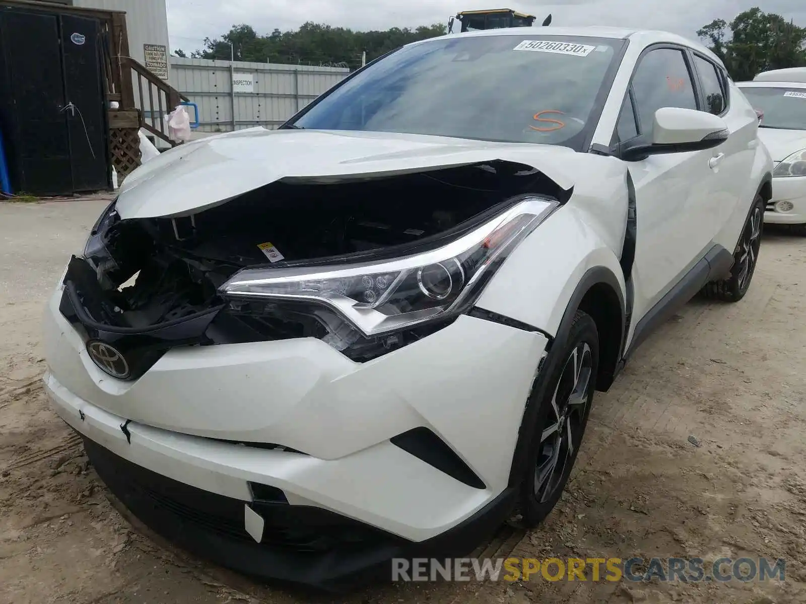 2 Photograph of a damaged car NMTKHMBX2KR070357 TOYOTA C-HR 2019