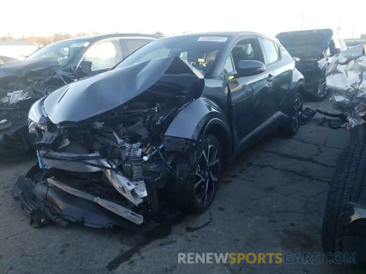 2 Photograph of a damaged car NMTKHMBX2KR076286 TOYOTA C-HR 2019