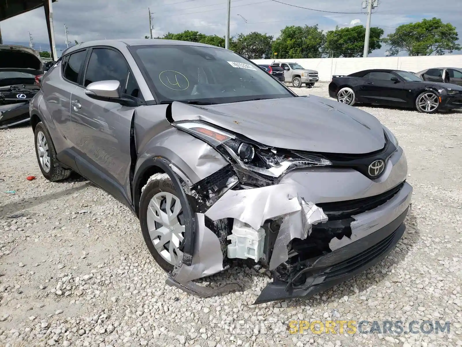 1 Photograph of a damaged car NMTKHMBX2KR084274 TOYOTA C-HR 2019