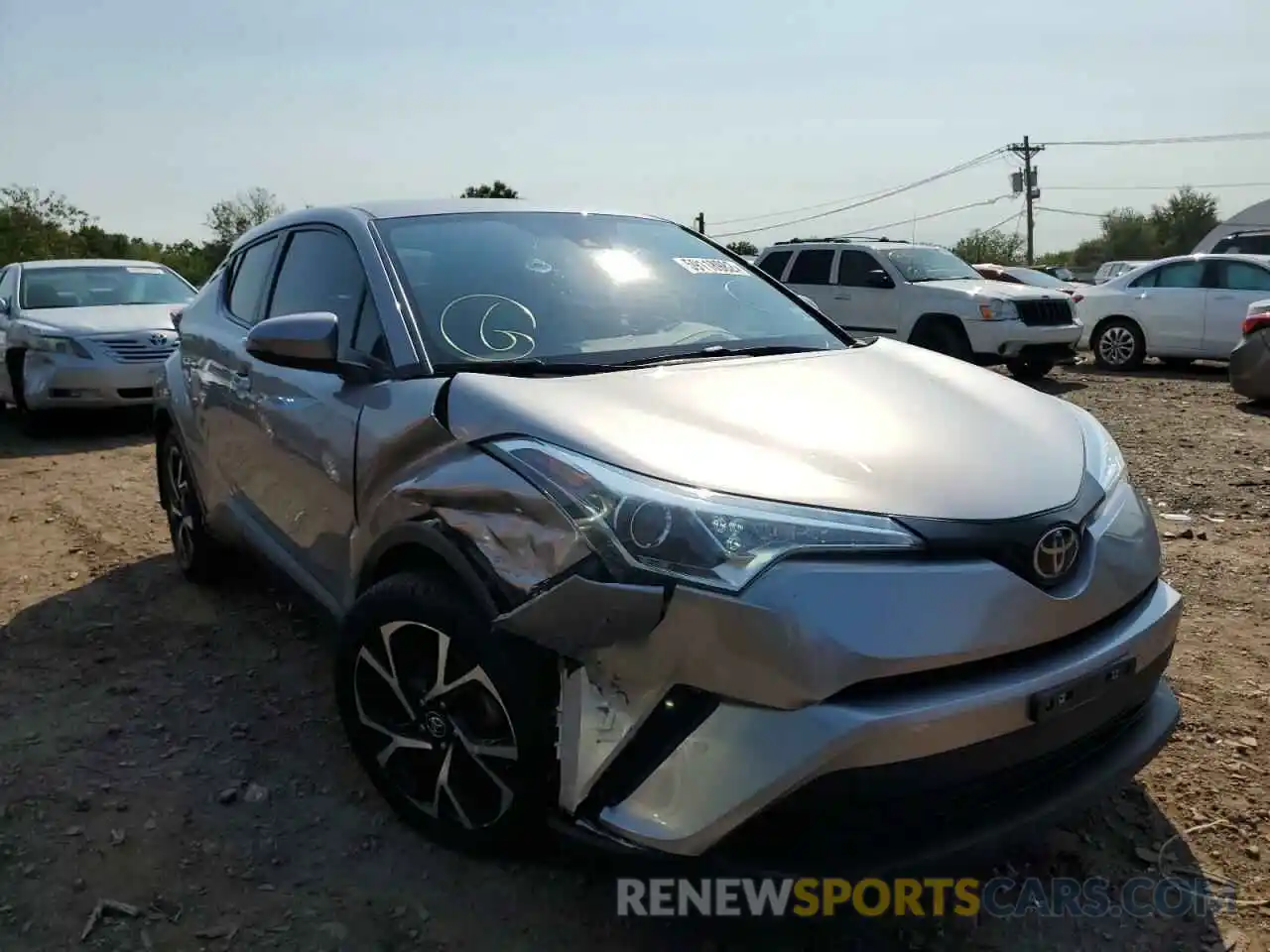 1 Photograph of a damaged car NMTKHMBX2KR096182 TOYOTA C-HR 2019