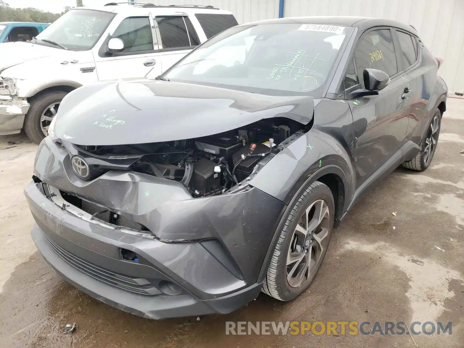 2 Photograph of a damaged car NMTKHMBX3KR068343 TOYOTA C-HR 2019