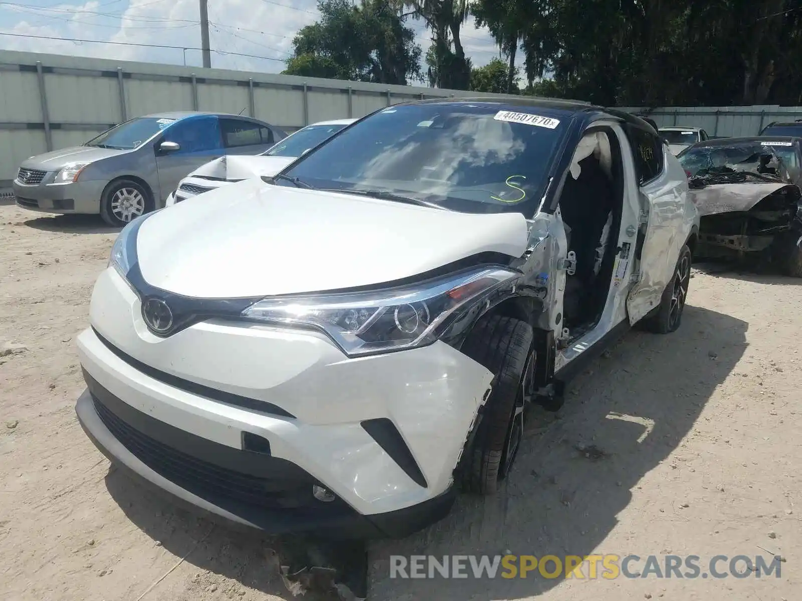 2 Photograph of a damaged car NMTKHMBX3KR074062 TOYOTA C-HR 2019