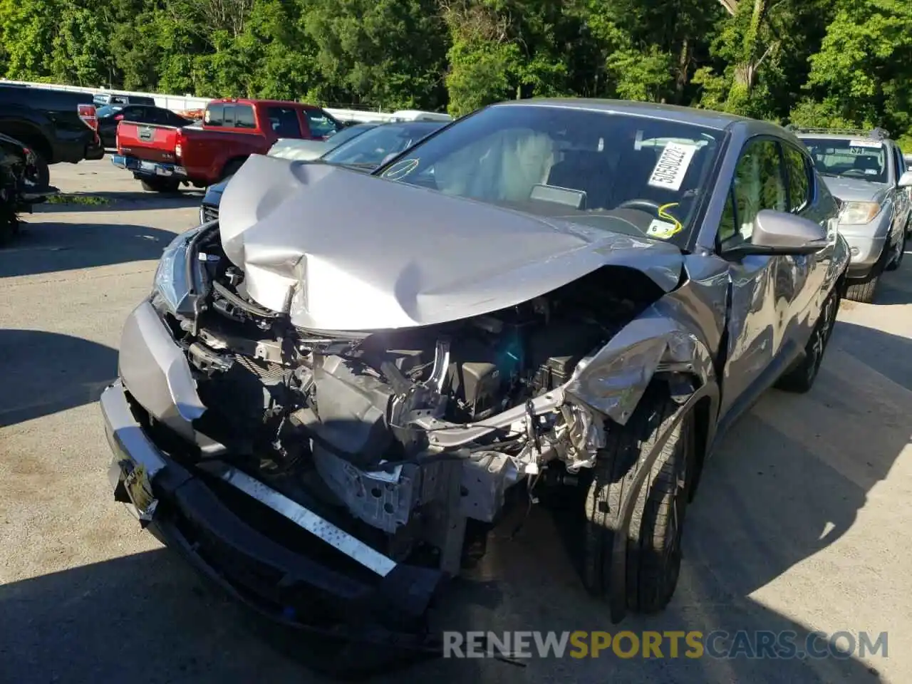 2 Photograph of a damaged car NMTKHMBX3KR075101 TOYOTA C-HR 2019