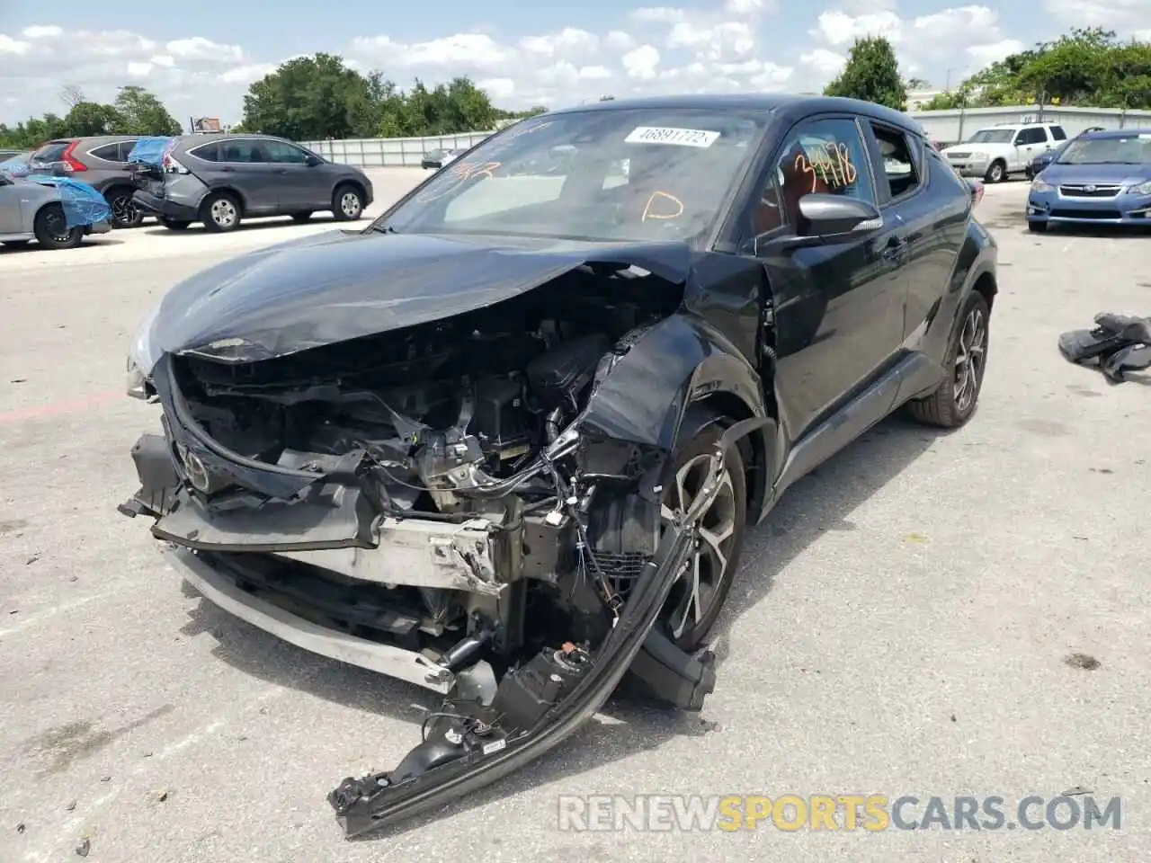 2 Photograph of a damaged car NMTKHMBX3KR079083 TOYOTA C-HR 2019