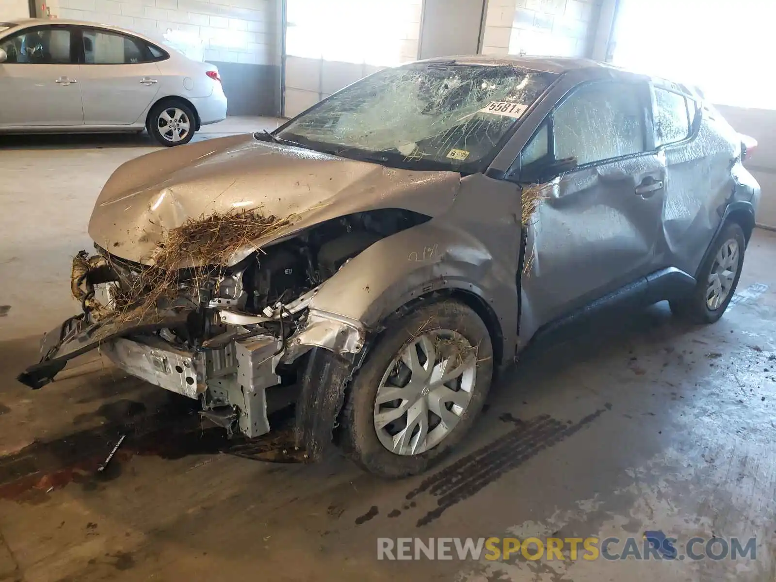 2 Photograph of a damaged car NMTKHMBX3KR082856 TOYOTA C-HR 2019