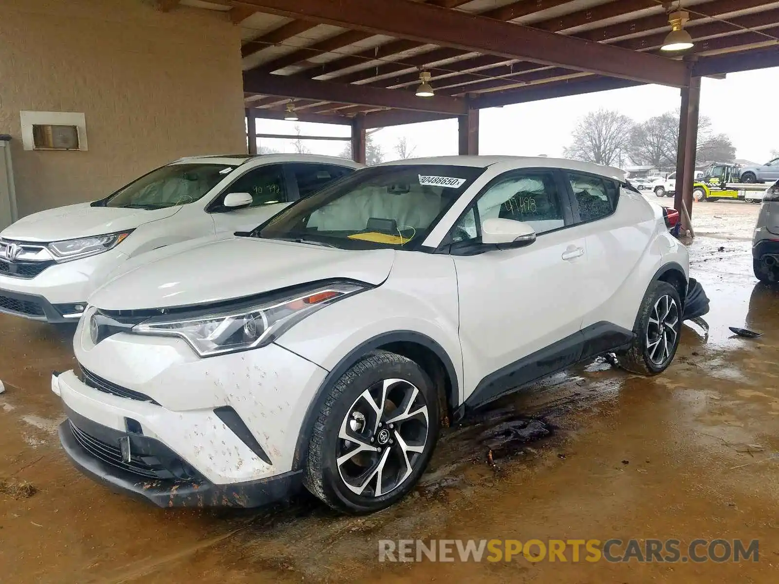 2 Photograph of a damaged car NMTKHMBX3KR083845 TOYOTA C-HR 2019