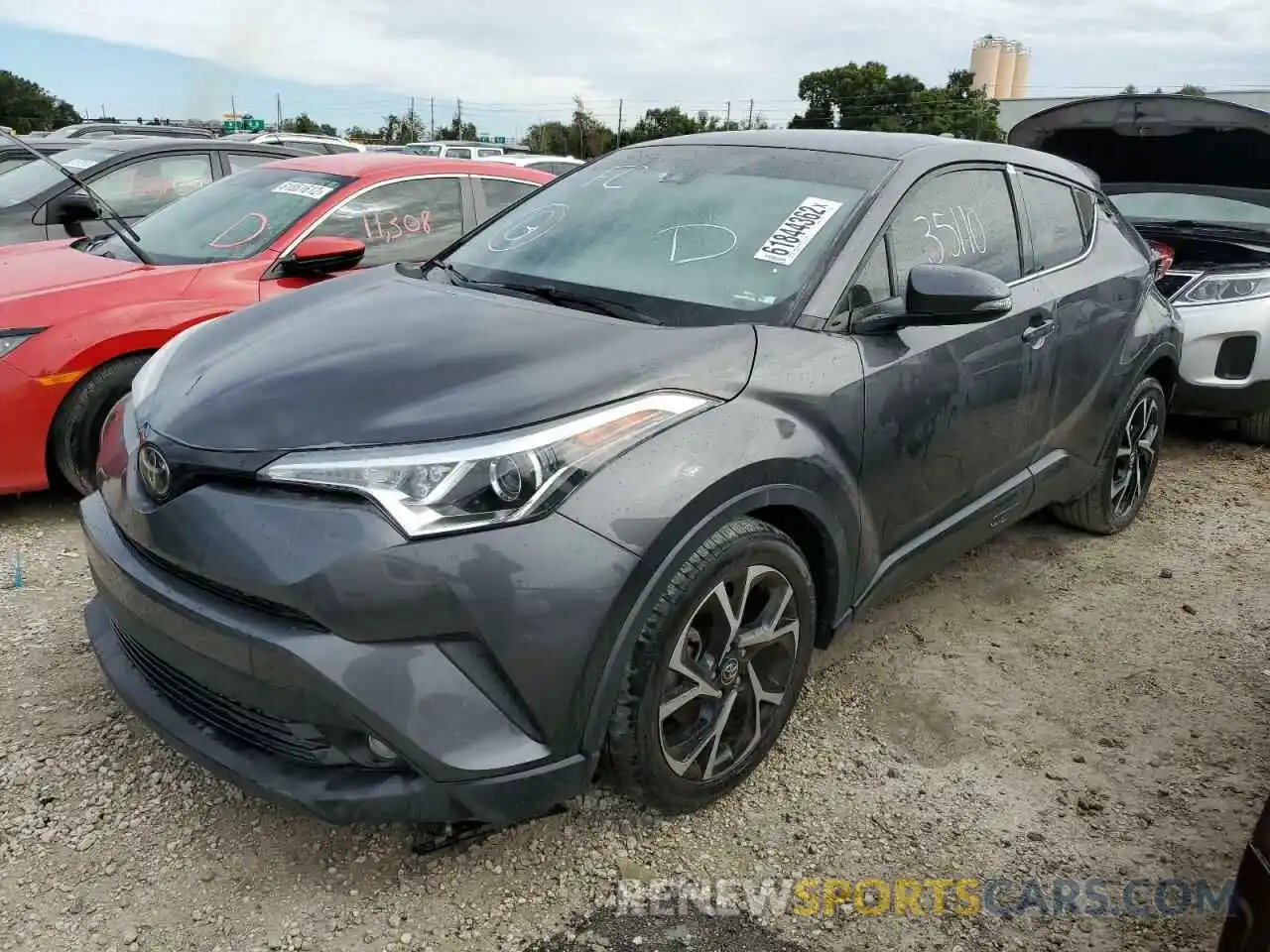 2 Photograph of a damaged car NMTKHMBX3KR098748 TOYOTA C-HR 2019