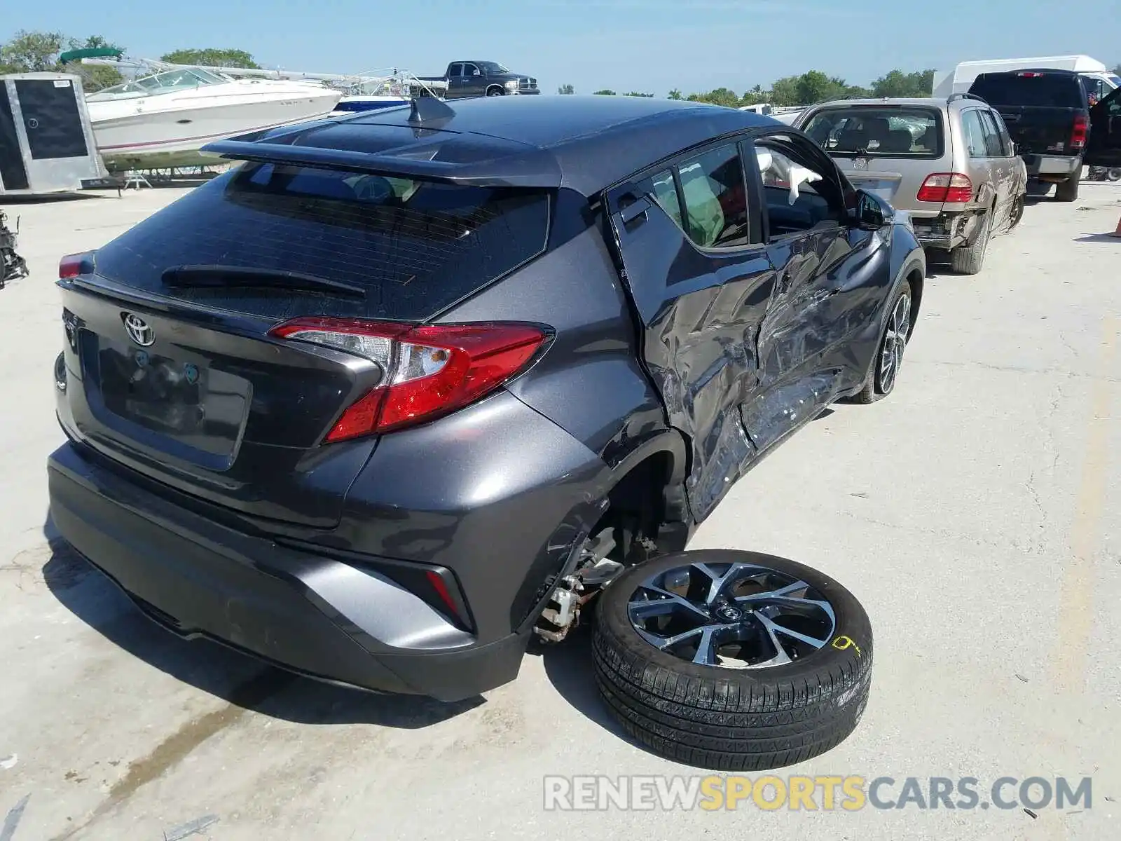 4 Photograph of a damaged car NMTKHMBX3KR100773 TOYOTA C-HR 2019