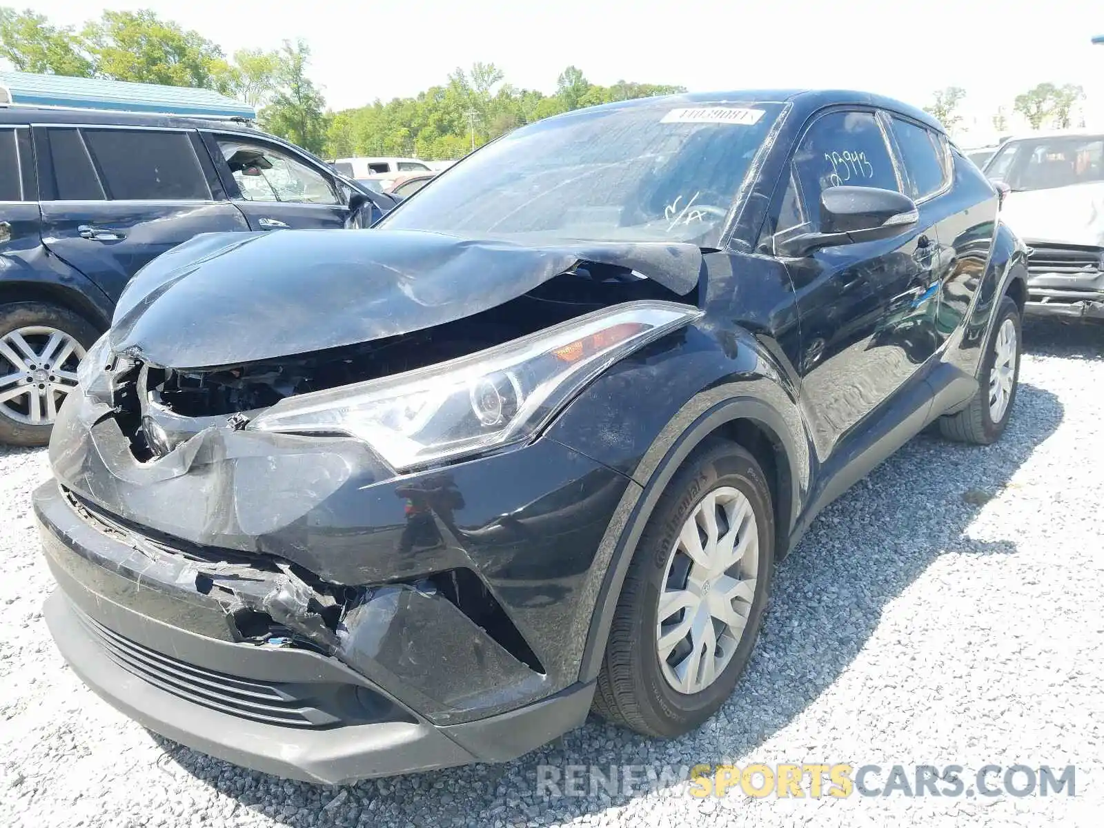 2 Photograph of a damaged car NMTKHMBX3KR101292 TOYOTA C-HR 2019