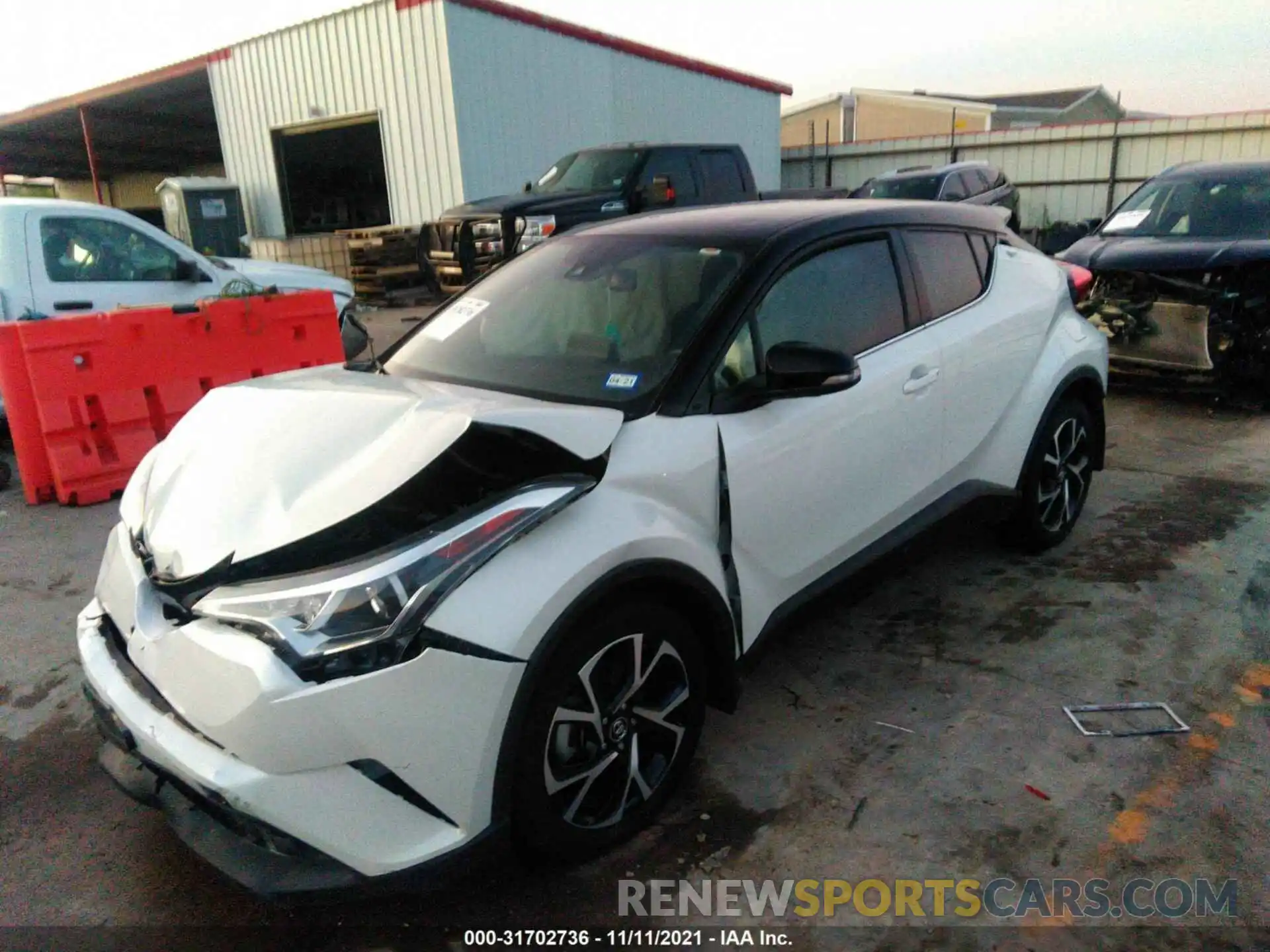 2 Photograph of a damaged car NMTKHMBX4KR086849 TOYOTA C-HR 2019