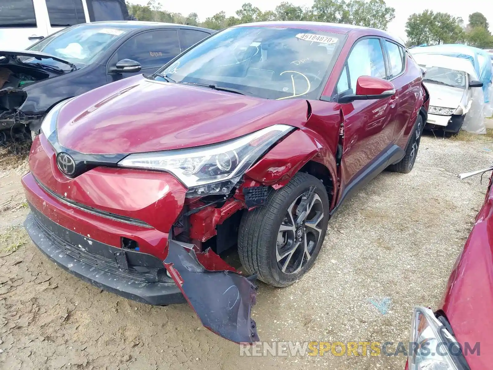 2 Photograph of a damaged car NMTKHMBX4KR097589 TOYOTA C-HR 2019