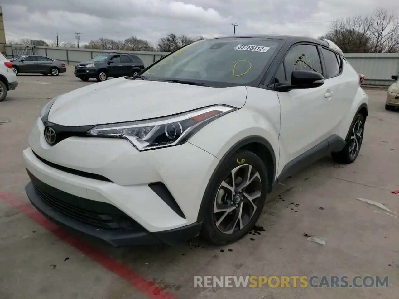 2 Photograph of a damaged car NMTKHMBX4KR098029 TOYOTA C-HR 2019