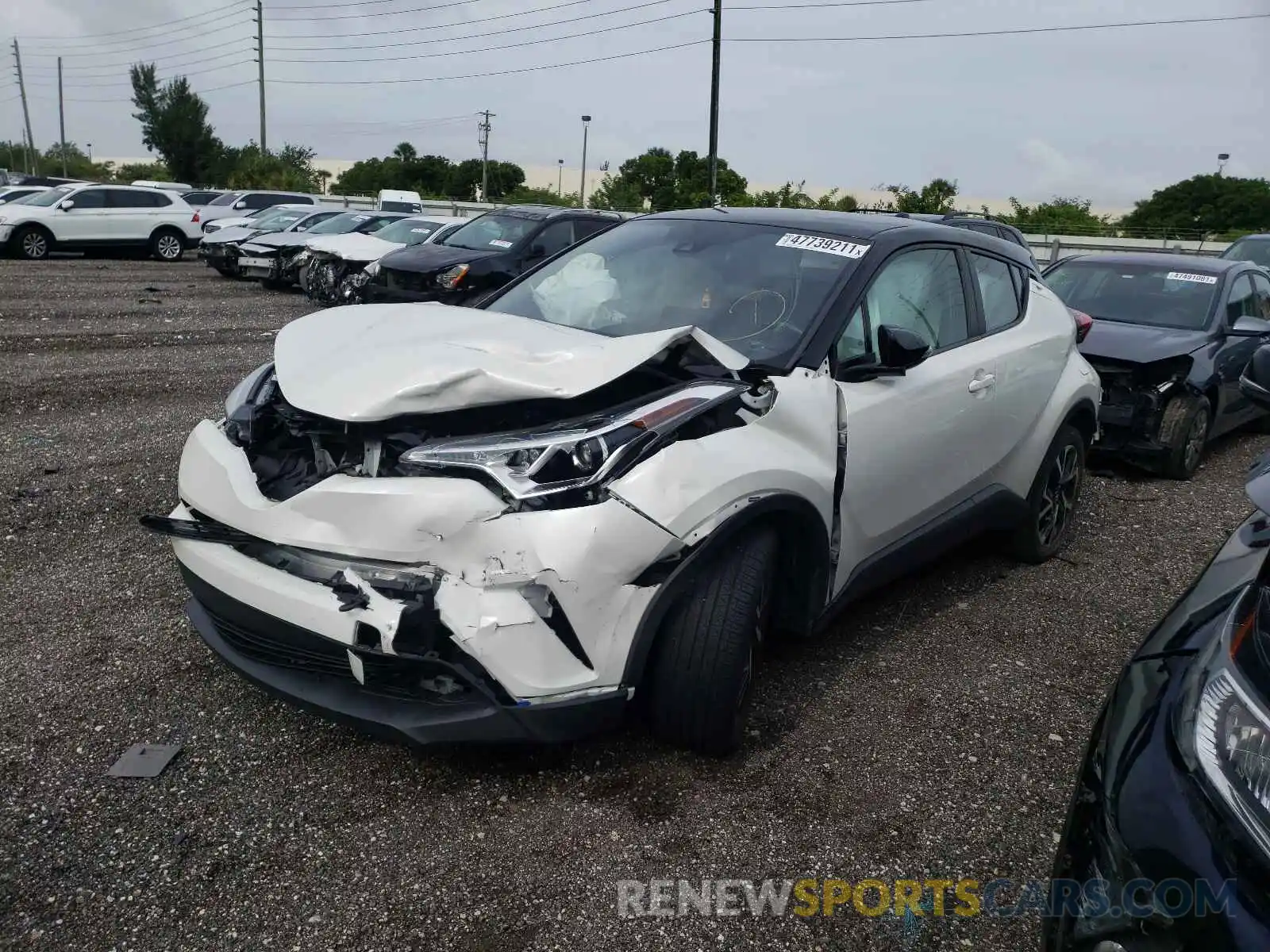 2 Photograph of a damaged car NMTKHMBX5KR093499 TOYOTA C-HR 2019