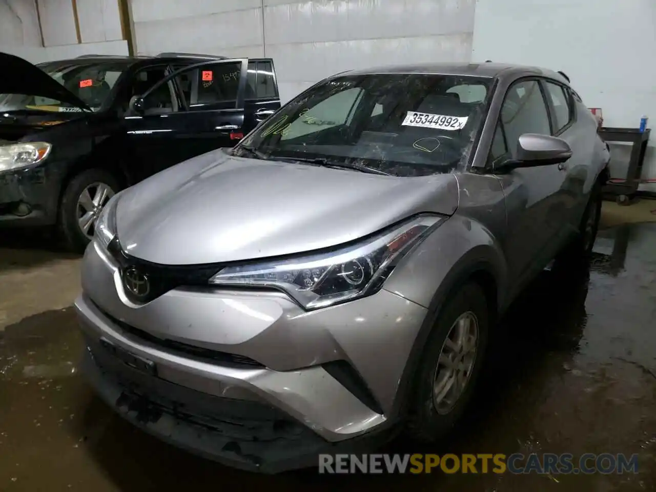 2 Photograph of a damaged car NMTKHMBX5KR096256 TOYOTA C-HR 2019