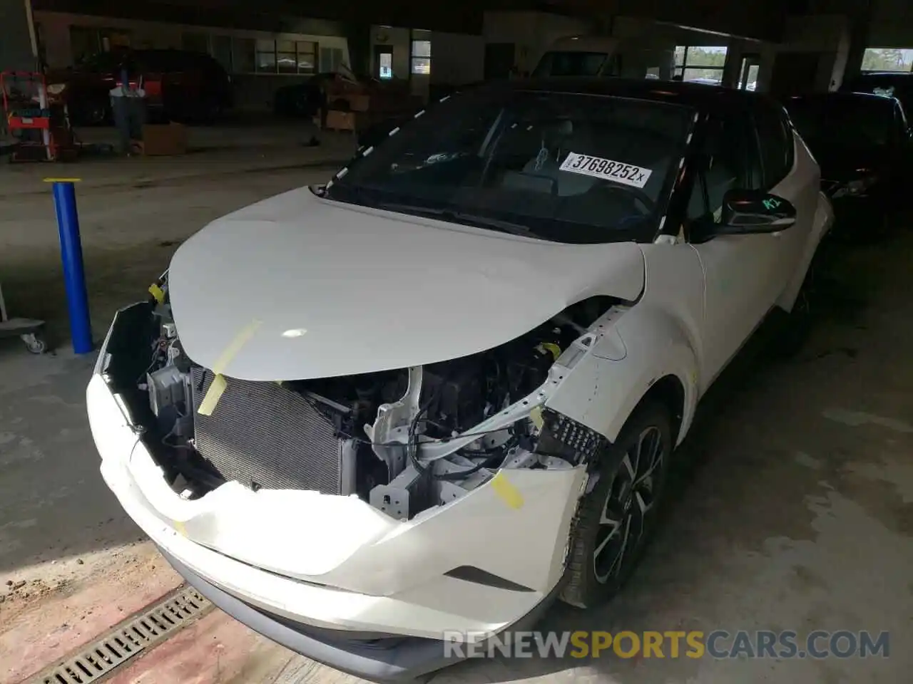 2 Photograph of a damaged car NMTKHMBX6KR095651 TOYOTA C-HR 2019