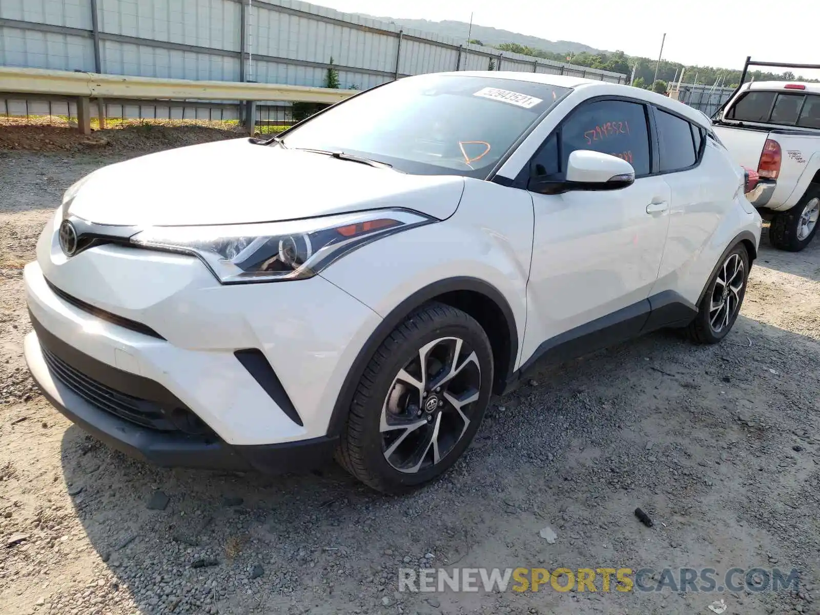 2 Photograph of a damaged car NMTKHMBX7KR077918 TOYOTA C-HR 2019