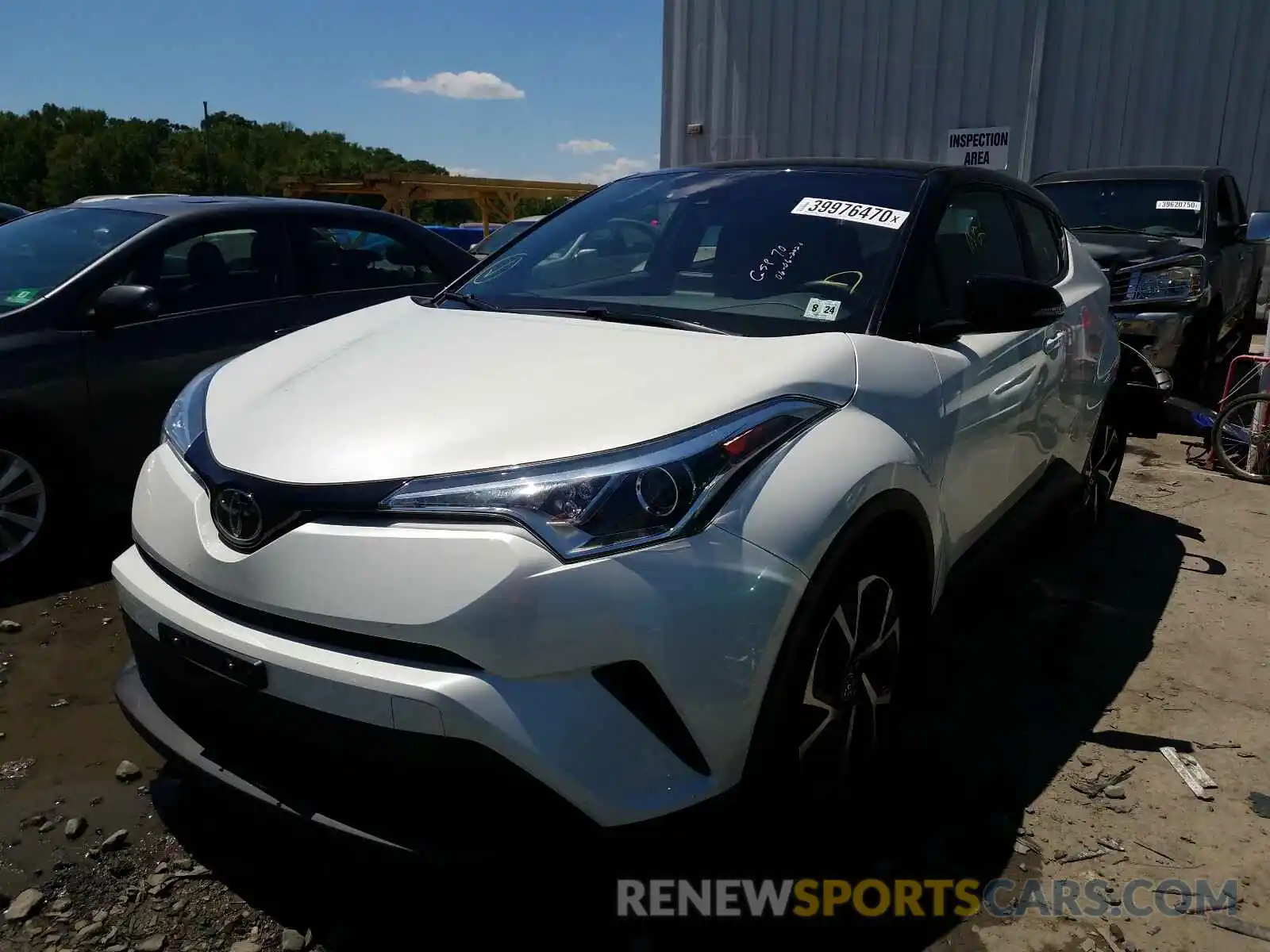 2 Photograph of a damaged car NMTKHMBX7KR093973 TOYOTA C-HR 2019