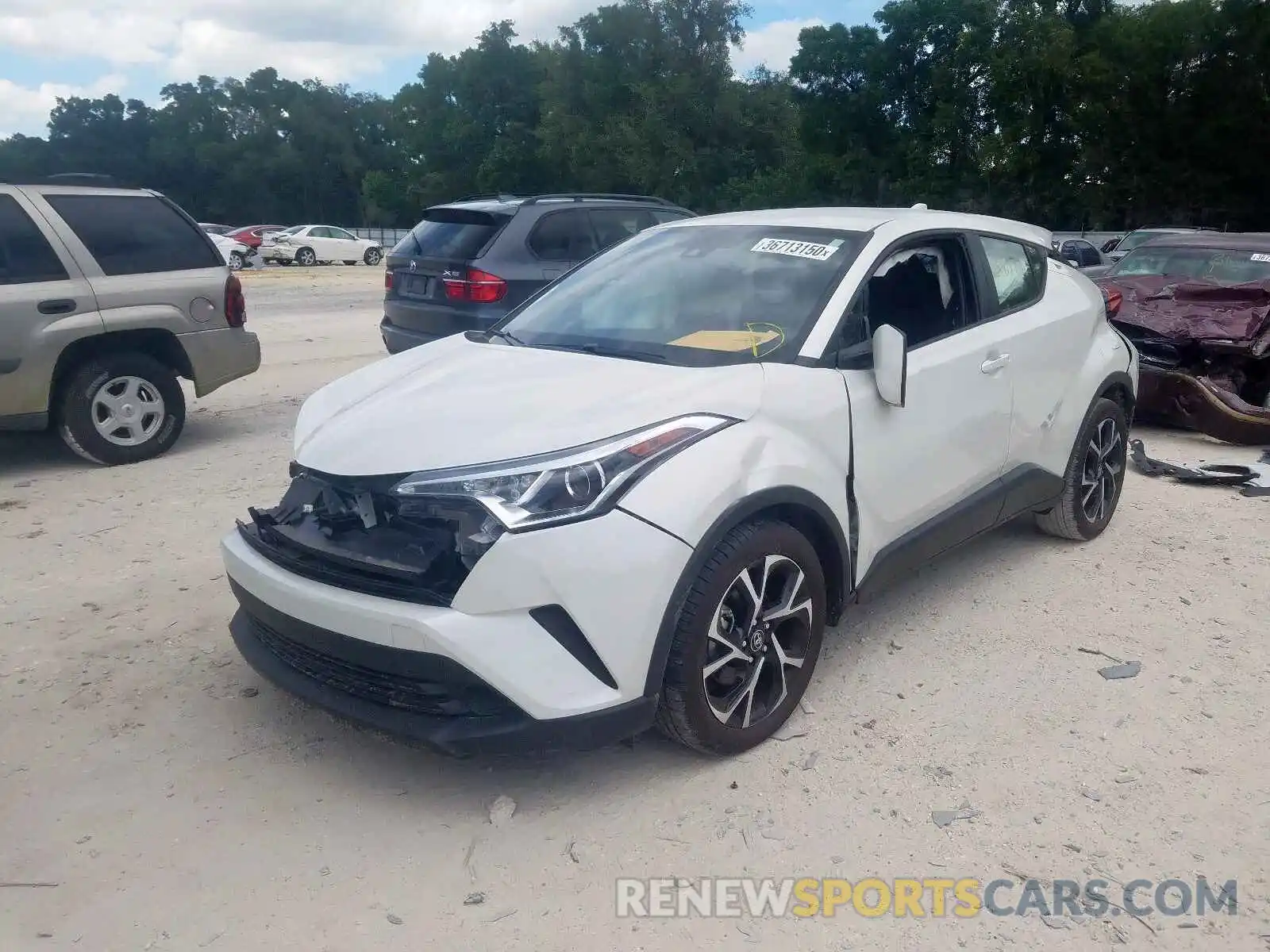 2 Photograph of a damaged car NMTKHMBX8KR086482 TOYOTA C-HR 2019