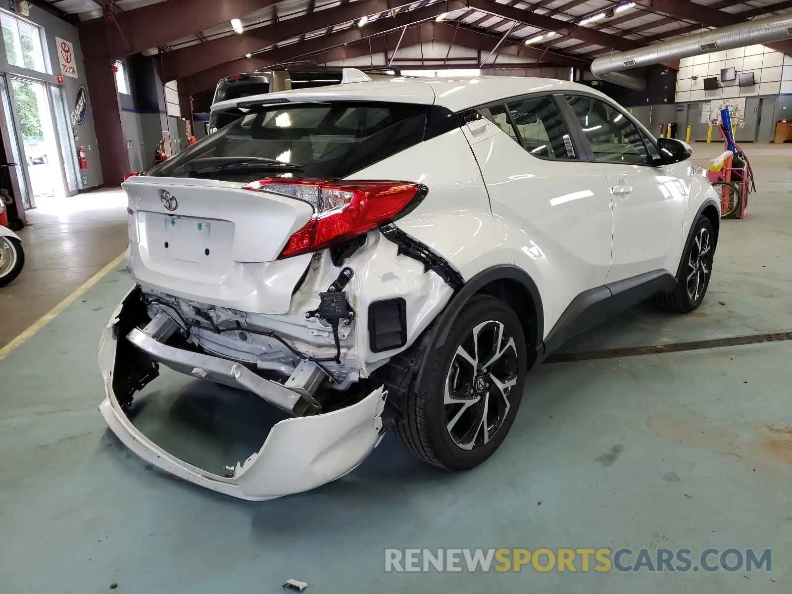 4 Photograph of a damaged car NMTKHMBX8KR090466 TOYOTA C-HR 2019