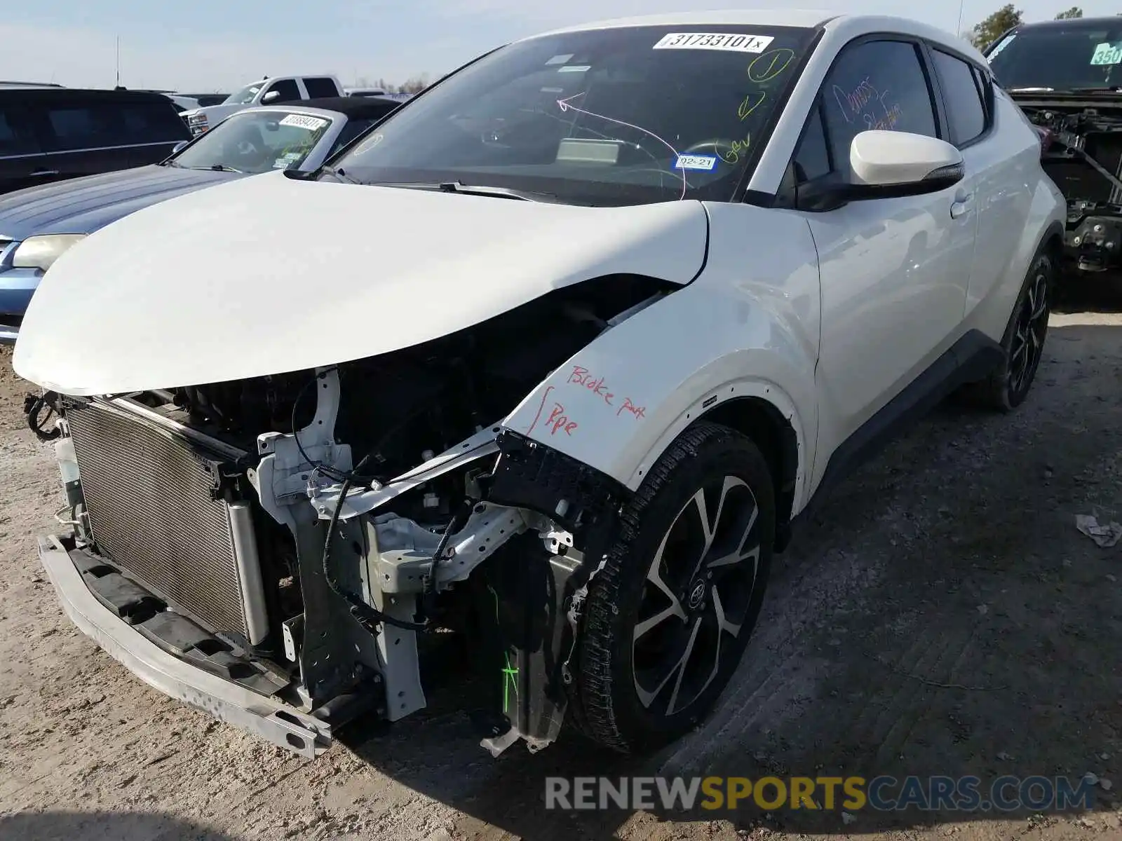 2 Photograph of a damaged car NMTKHMBX9KR083705 TOYOTA C-HR 2019